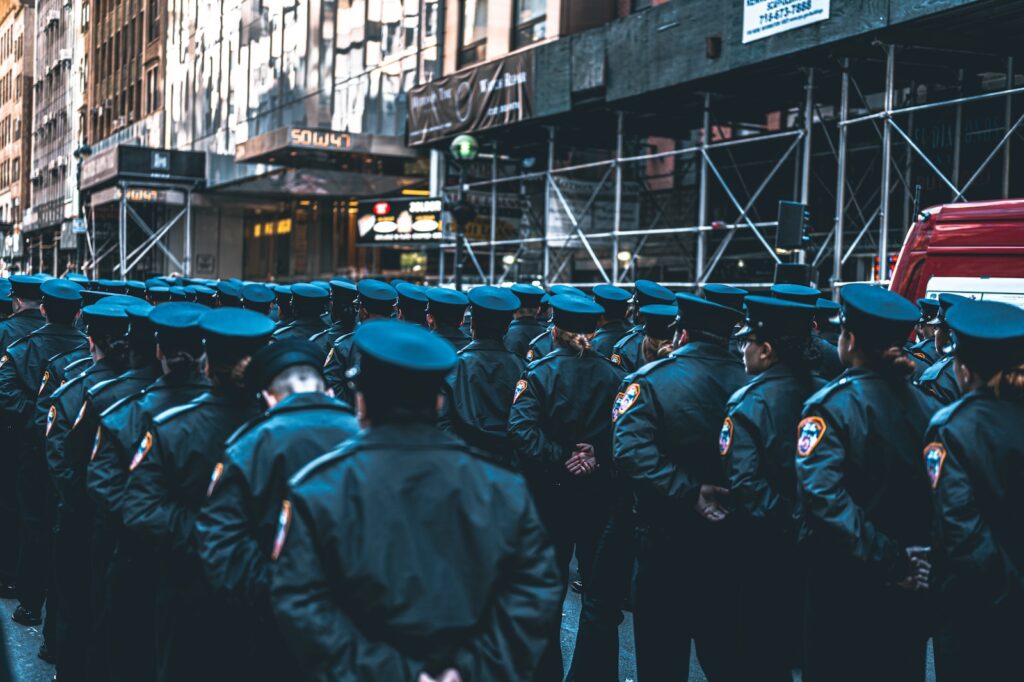 a group of police officers standing in a line